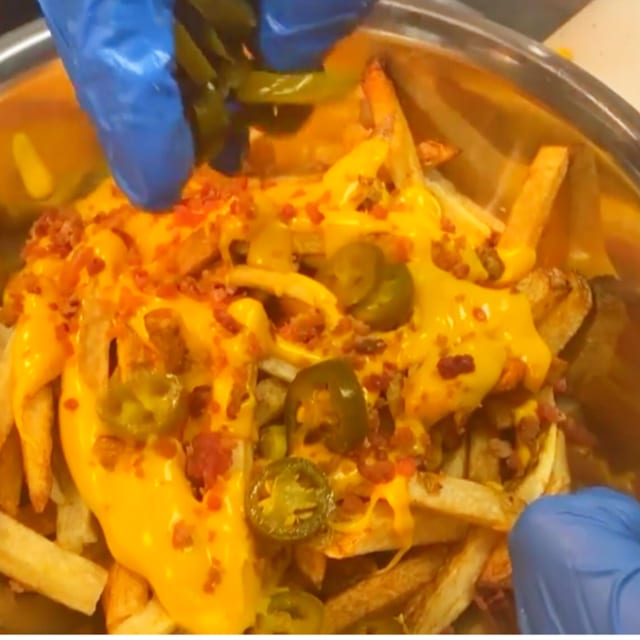 Shareable Texas Cheese Fries.